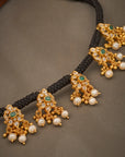 TRADITIONAL EMERALD BLACK THREAD NECKLACE