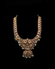 ANTIQUE PEACOCK HAAR