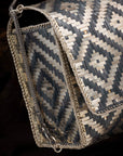 WEAVE CLUTCH