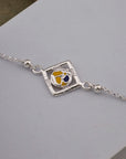 OM SILVER CHARM RAKHI