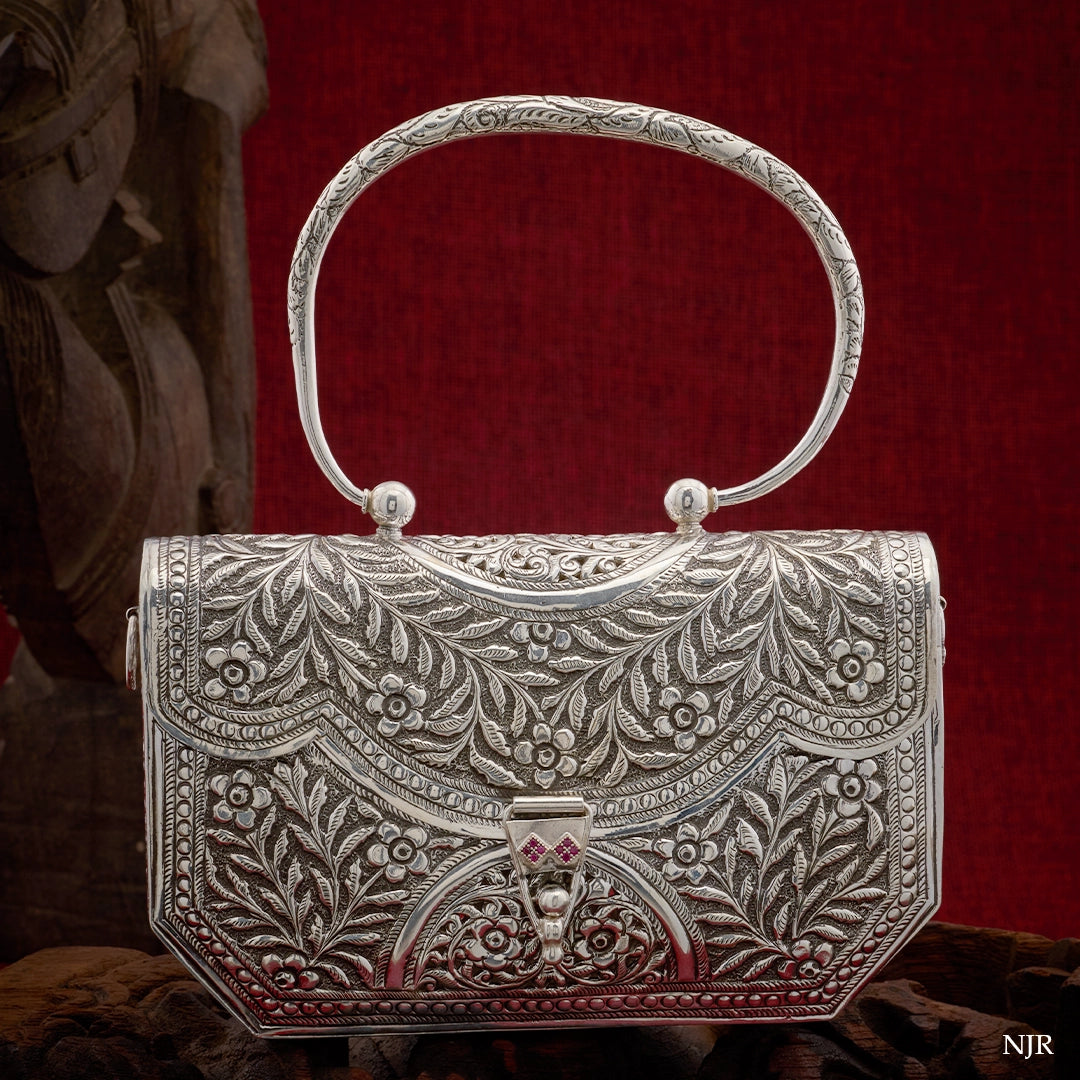 BOTANICA SILVER CLUTCH