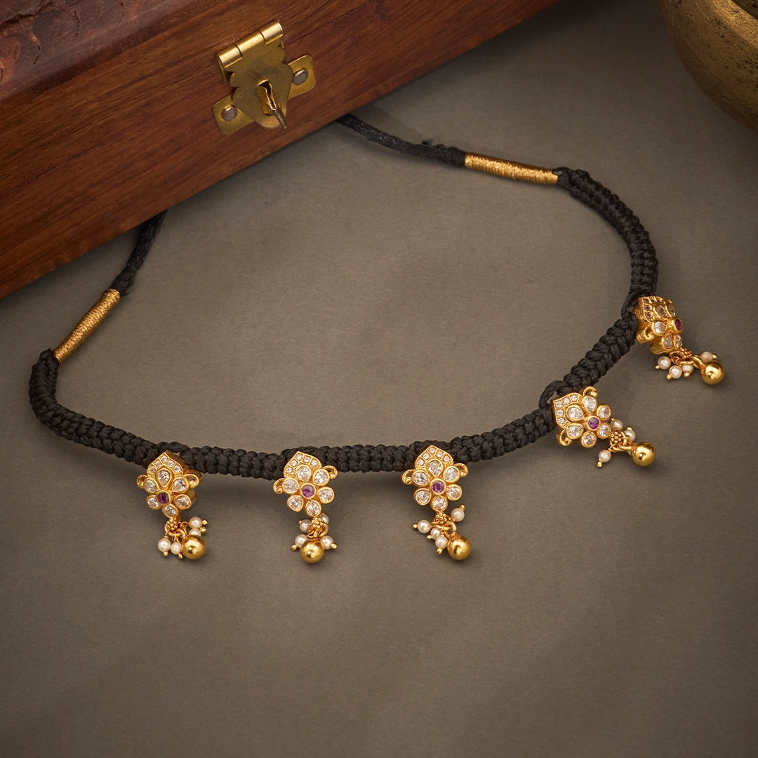 ANTIQUE BLOOMS BLACK THREAD NECKLACE