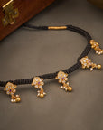 ANTIQUE BLOOMS BLACK THREAD NECKLACE