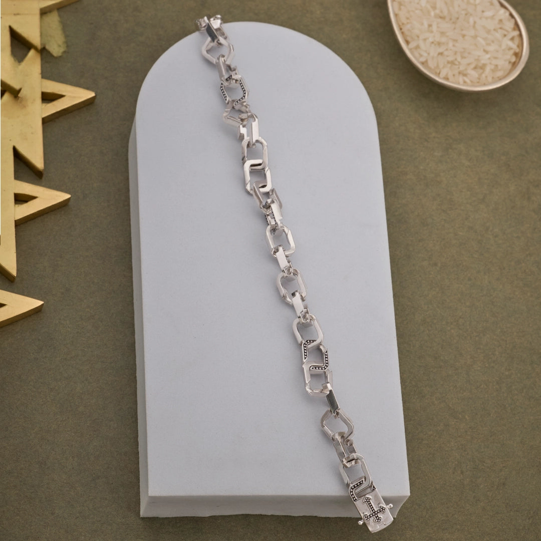 CROSS CURB BRACELET