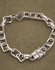 CROSS CURB BRACELET