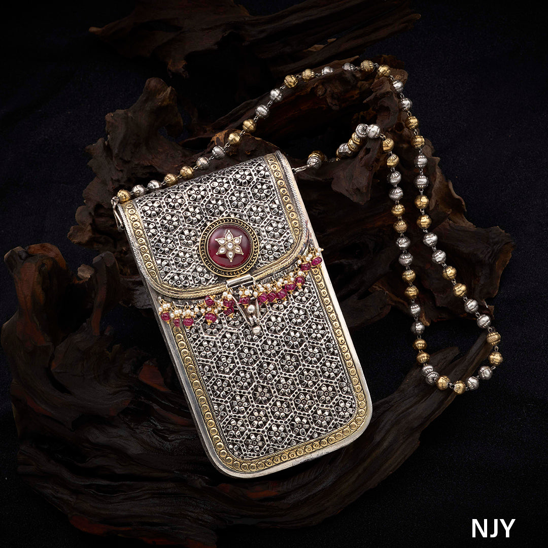 DEVIKA SILVER CLUTCH