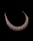 SILVER ROSE GOLD ZIRCON NECKLACE WITH EARRINGS.