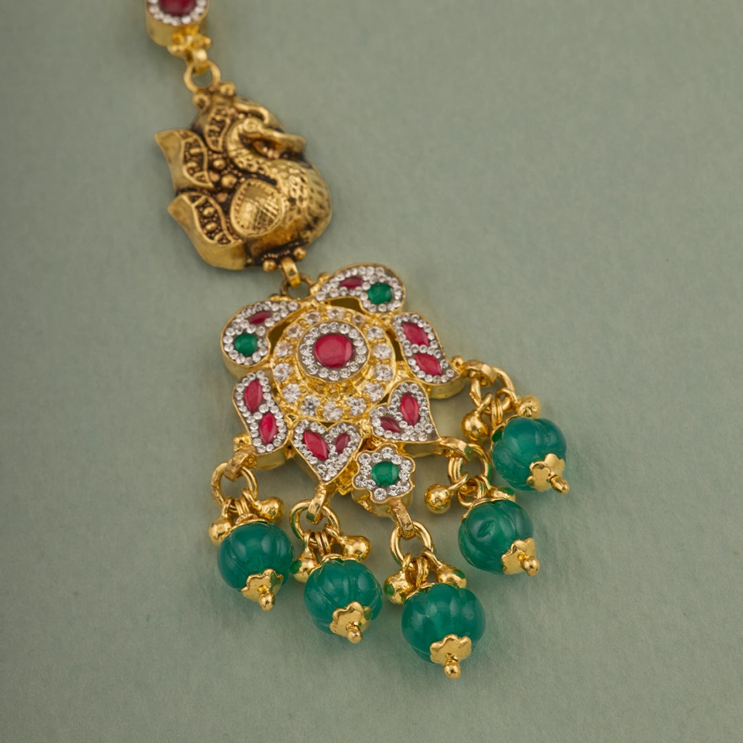EMERALD DROP MAYURA MAANG TIKA