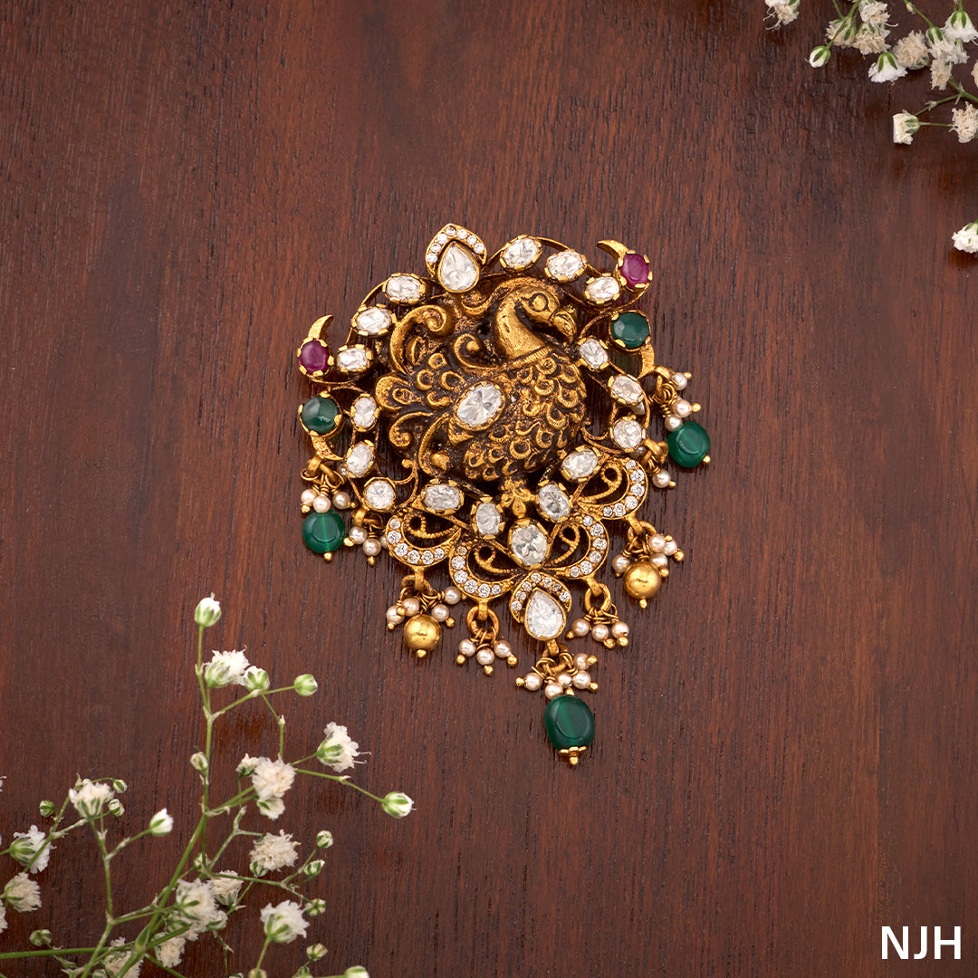PEACOCK PENDANT WITH WHITE STONE